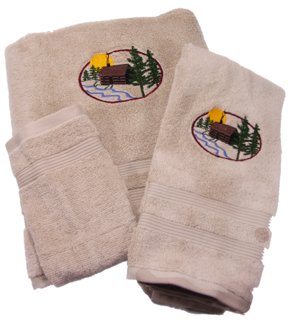 Embroidered log cabin in the woods on cotton bath Towel